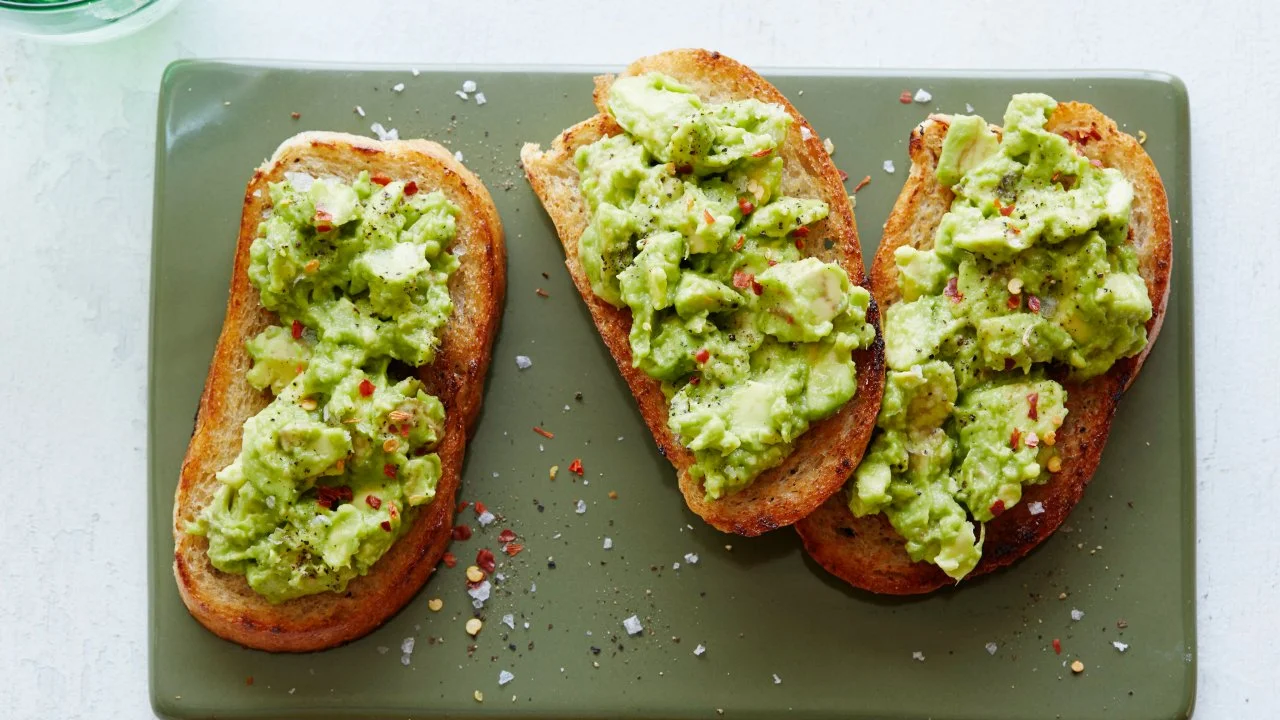 Brown bread with half avocado